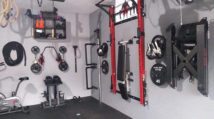 home gym organized in a garage